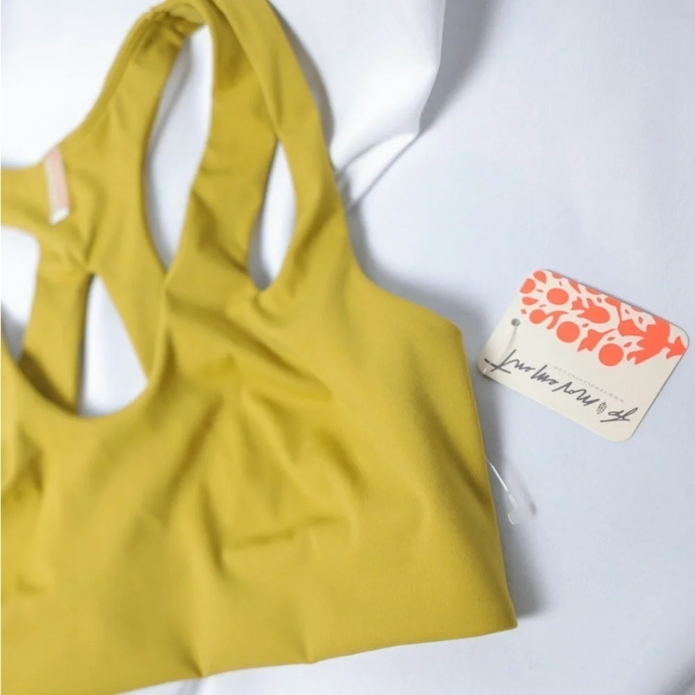 🅽🅴🆆 𝓕𝓻𝓮𝓮 𝓟𝓮𝓸𝓹𝓵𝓮 Movement racerback marigold sports bra, size XS